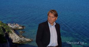 La spiaggia del Cannone in una foto di qualche estate fa e Andrea Casamenti