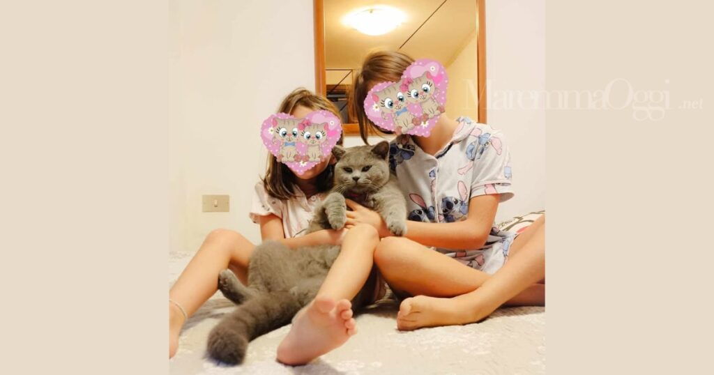 Il gatto Baù con le due bambine