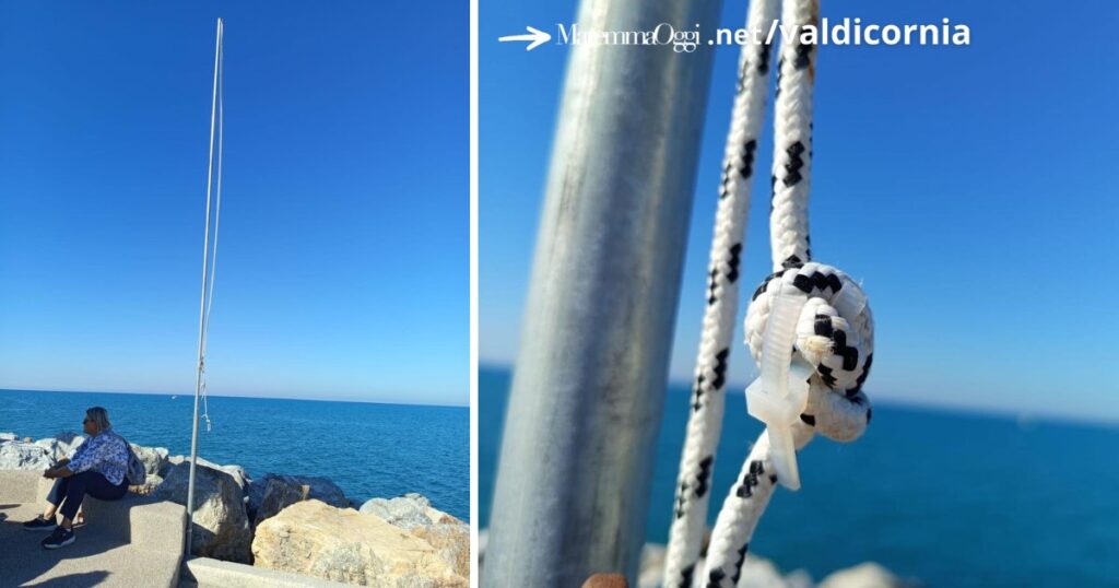 Il palo dov'era attaccata la bandiera della Palestina accanto alla statua del Marinaio