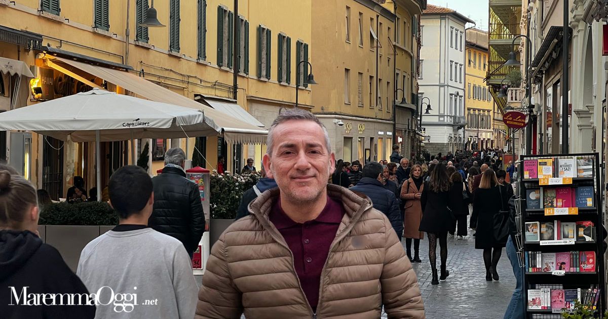 Una foto del centro storico e Alberto Macchi