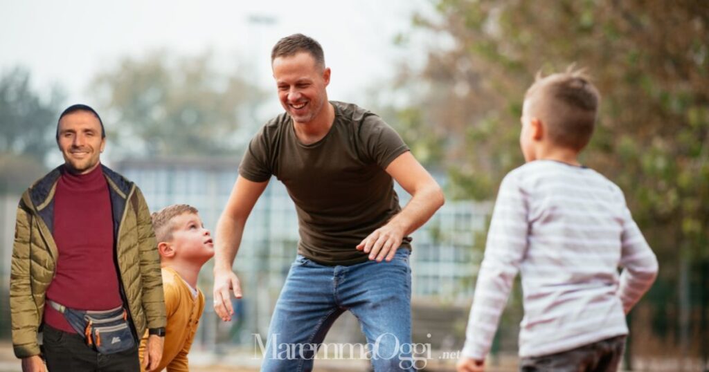Un padre con i figli e Giuseppe Carobene
