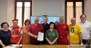 Don Enzo e gli altri protagonisti del progetto "Abitare la notte"