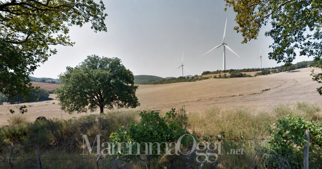 La zona di Poggio Renaio con un fotoinserimento AI di pale eoliche alte 220 metri