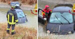 L'auto nel canale e l'intervento dei vigili del fuoco